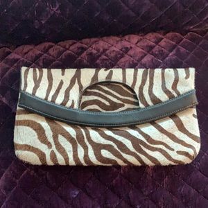 Zebra clutch or handle purse.